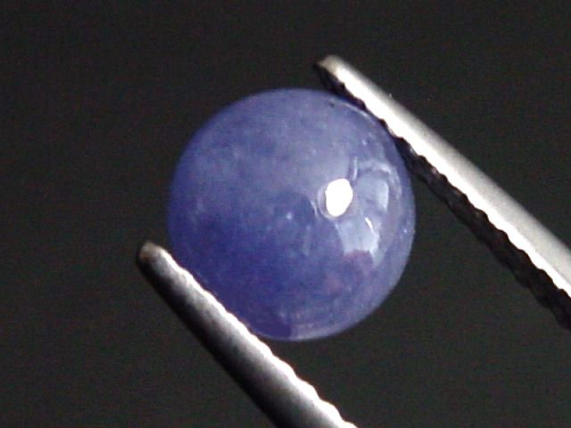 Tansanit 1,95 Ct. violett 7 mm Rund Cabochon