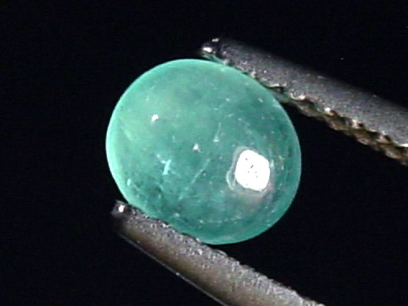 Grandidierit 0,42 Ct. selten Oval Cabochon Andrahomana, Madag.
