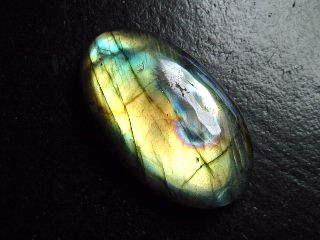 Labradorite 56,59 Ct. oval cabochon Australia