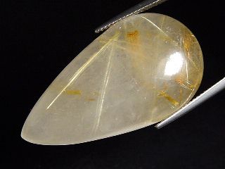 Rutile Quartz 47,92 Ct. fine golden needles pear cabochon