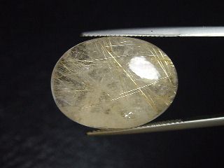 Rutile Quartz 29,23 Ct. golden Rutile needles oval cabochon