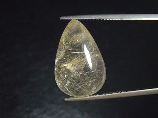 Rutilquarz 18,70 Ct. goldene Rutileinschlüsse Tropfen Cabochon