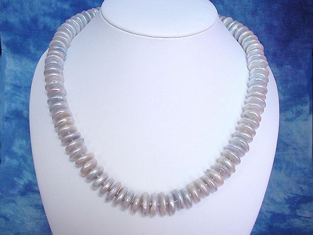 Perlenkette 670,20 Ct. moderne Button Perlen Kette mit Silber 55 cm