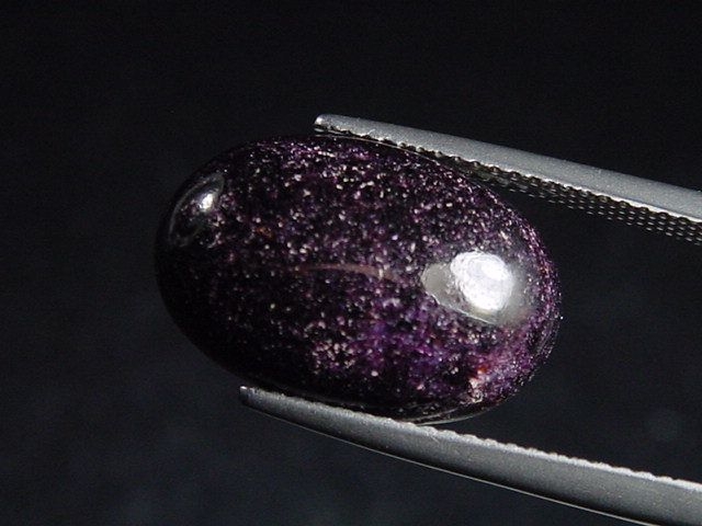 Sugilit 10,71 Ct. Oval Cabochon - Wessels mine, Kuruman, Südafrika