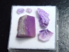 Sugilite lot in box - Wessels mine, Kuruman, Southafrica