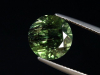 Peridot mit dekorativen Einschlüssen 6,03 Ct. Rund 11 mm Pak.