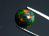 Black Opal 3,00 Ct. treated - round cabochon