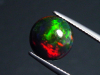 Black Opal 2,85 Ct. treated - round cabochon