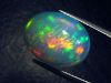 Opal 11,75 Ct. finest quality - oval cabochon