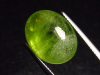 Peridot 14,37 Ct. applegreen oval cabochon