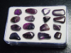 Sugilith Trommelsteine Lot in Box - Wessels mine, Kuruman, Südafrika